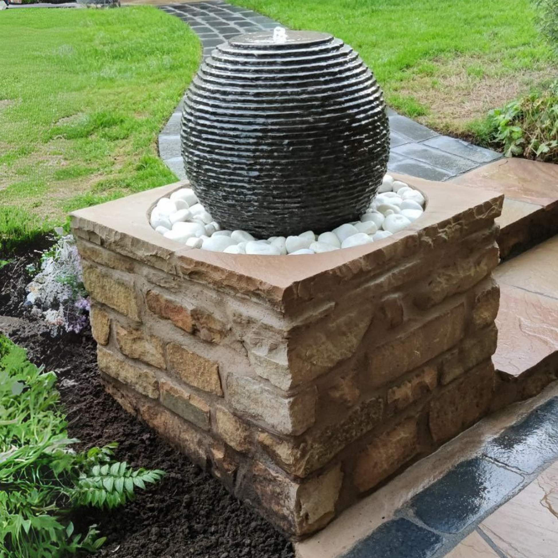 Cascading Limestone Sphere Black