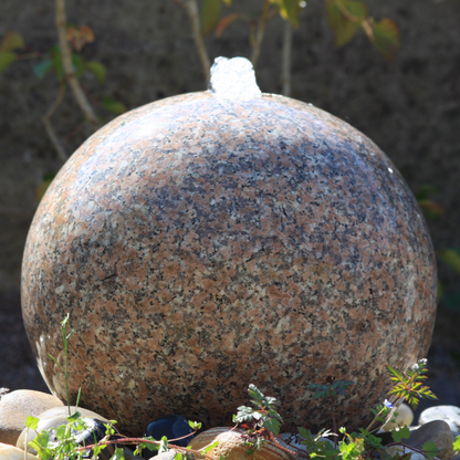 Polished Drilled Pink Granite Sphere