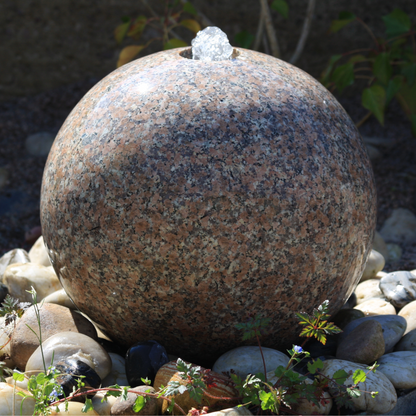 Polished Drilled Pink Granite Sphere