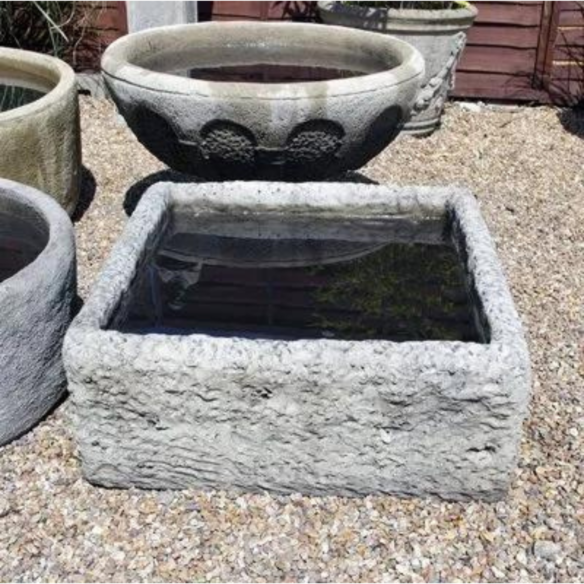 Water Bearer Fountain with Square Reservoir Stone